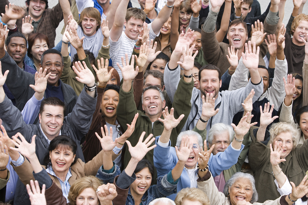 High,Angle,View,Of,Group,Of,Happy,Multiethnic,People,Raising